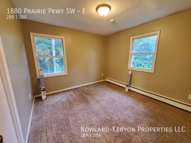 Building Photo - 1880 Prairie Pkwy SW - E- 2 beds, 1 full bath