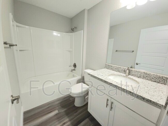 Building Photo - 10057 N Athenia Dr