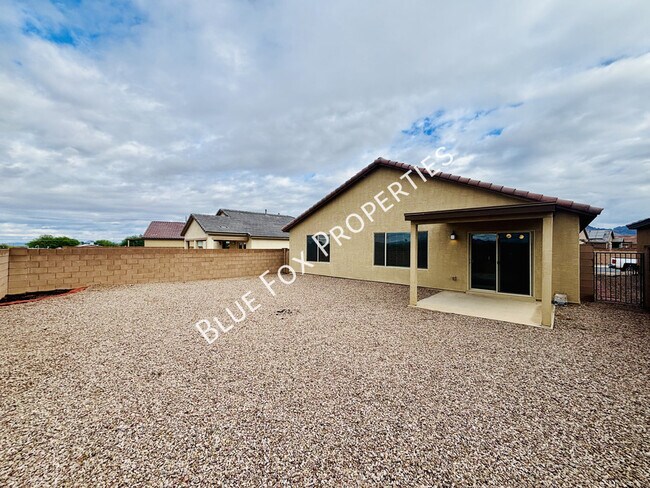 Building Photo - 6563 W Camino Pizarro