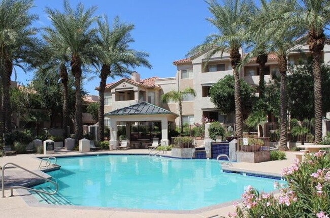 Building Photo - "Charming 1-Bedroom Retreat with Fireplace & Pool in Phoenix Oasis!"