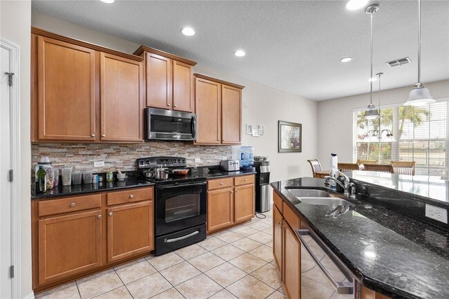 Building Photo - 6102 Roseate Spoonbill Dr