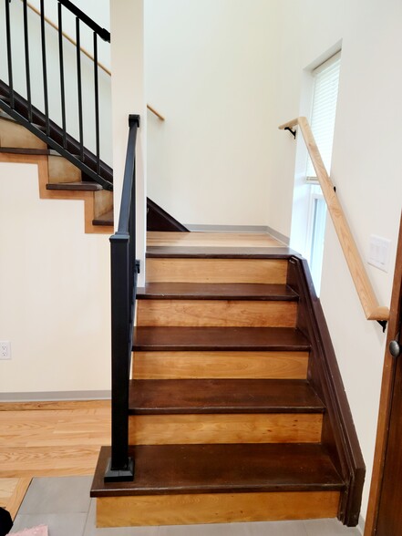 Stairs to the bedroom. - 6735 Henry Rd