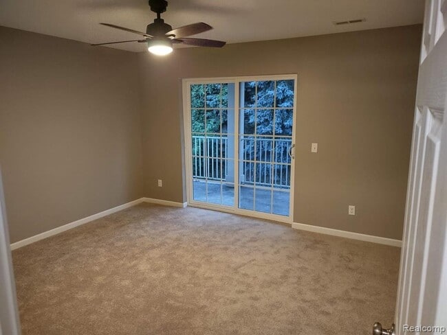 Building Photo - Charming 2-Bed Home in Commerce Township with Modern Amenities