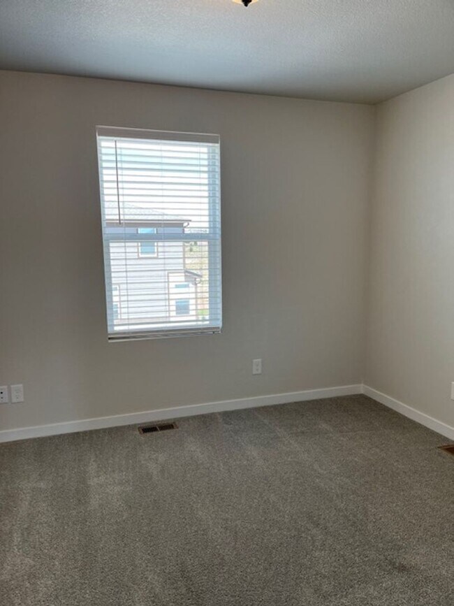 Building Photo - MODERN THREE STORY TOWNHOME WITH 2 CAR GAR...