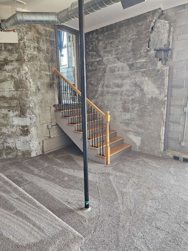 Building Photo - Unique 2 Bedroom Downtown Mount Clemens Loft with Updated Kitchen, Spacious Living Room, Balcony ...