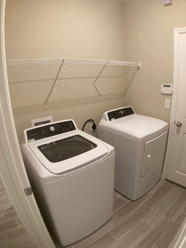 Building Photo - Your Private Escape with High-End Finishes...