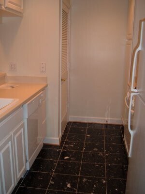 Primary Photo - Updated 1BR Condo with Parking Near Virgin...