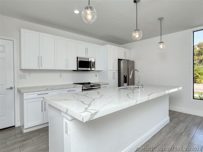 Building Photo - 102-116 NW 41st St