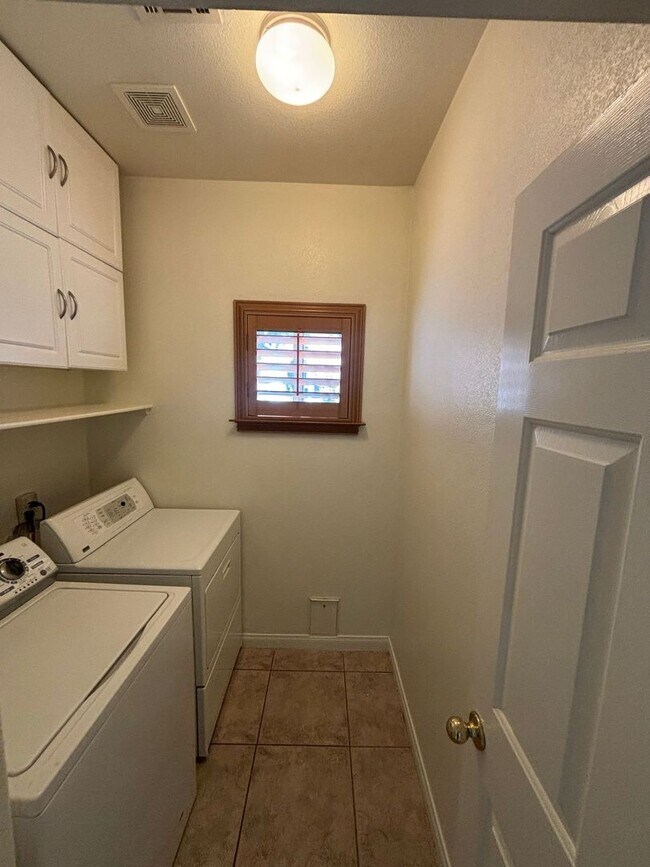 Building Photo - Gated Green Valley Ranch Townhome | 2 Bed | 2.5 Bath | 2-Car Garage