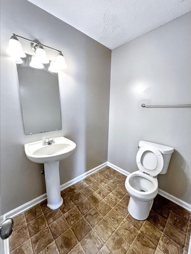 Building Photo - Spacious 3-Bedroom Home with Deck, Firepla...