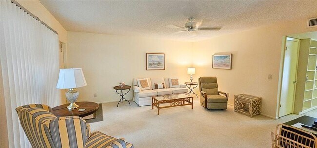 Building Photo - Annual Fully Furnished 2/2 Condo with Golf...