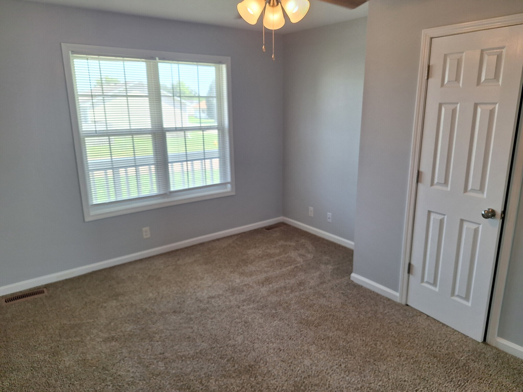 Master bedroom with ceiling fan - 695 Artic Ave