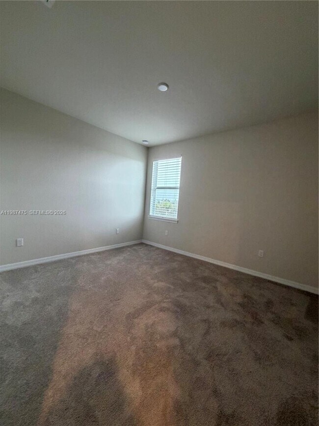 Building Photo - 12251 SW Periwinkle Ct