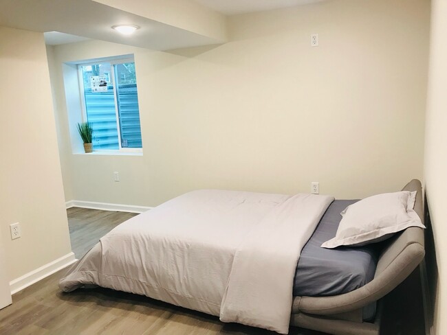 Bedroom #4 with large egress window, lots of natural light - 4806 Cherokee St