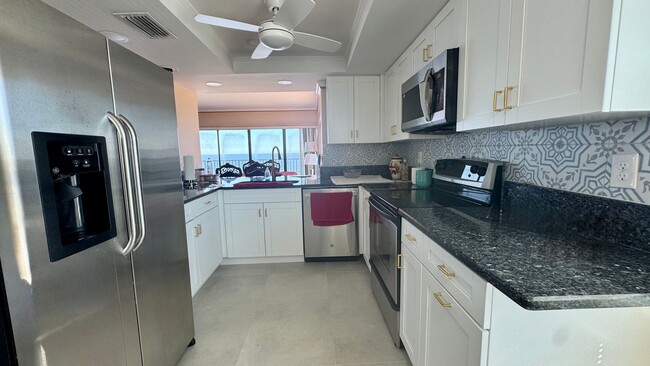 Building Photo - Furnished Beach Front Condo!! Enjoy Costal...