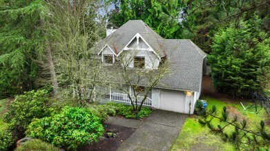 Building Photo - Bright 3-Bed Bothell Home with Attached Garage, Cozy Fireplace, and Private Garden Oasis