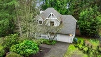 Building Photo - Bright 3-Bed Bothell Home with Attached Garage, Cozy Fireplace, and Private Garden Oasis