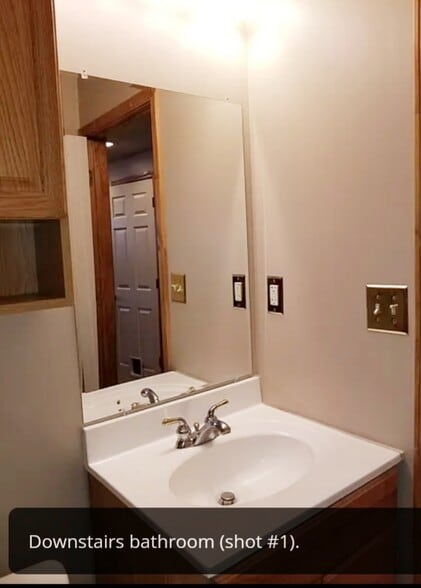 Lower level half bath - 21506 W 53rd Terrace