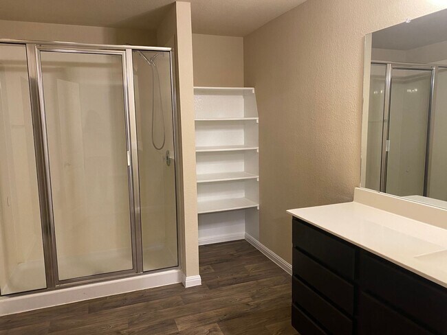 Building Photo - Three Bedroom, Two Bath, Two Car Garage, Washer and Dryer are included.