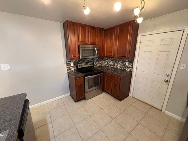 Building Photo - Beautiful updated home with new flooring and fresh paint