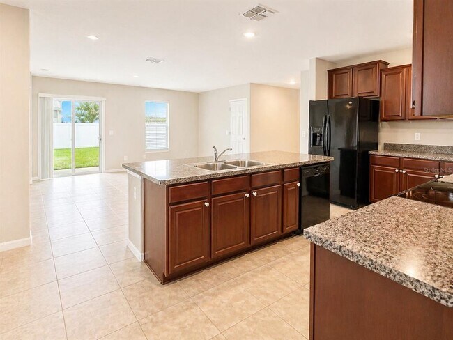 Building Photo - 7406 Rosy Periwinkle Ct