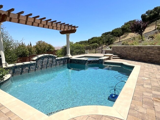 Building Photo - NEW PRICE ! Luxurious & Sought After Home In The Bucolic Hills Of Gated Norris Canyon Estates !