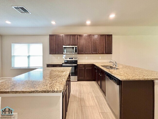 Building Photo - A Stunning Modern Home with Open Floor Pla...
