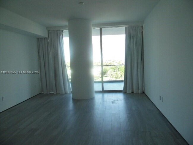 Building Photo - 10201 Collins Ave