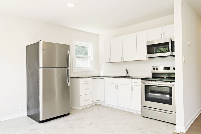 Building Photo - Dog-Friendly Apartment With Ting Fiber Internet