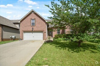 Building Photo - Pet Friendly Three Bedroom with Bonus!