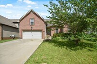 Building Photo - Pet Friendly Three Bedroom with Bonus!