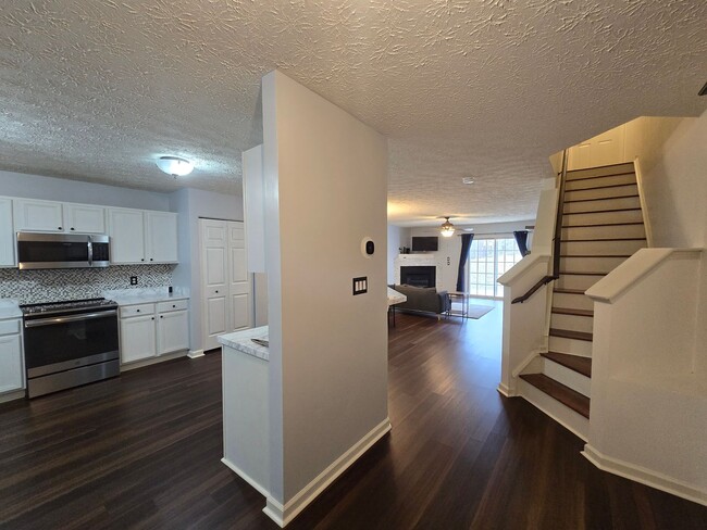 Building Photo - Super Adorable End-Unit Townhome in RTP with Designer Flair!