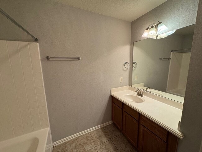 Building Photo - Updated Midway ISD Duplex