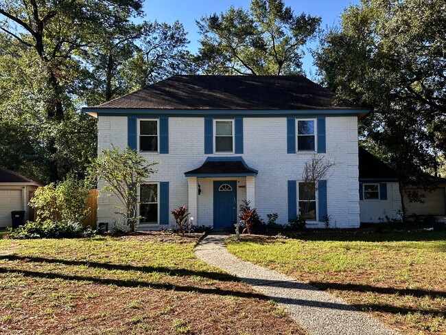 Front view with walkway. Attached garage - 15231 Highsprings Dr