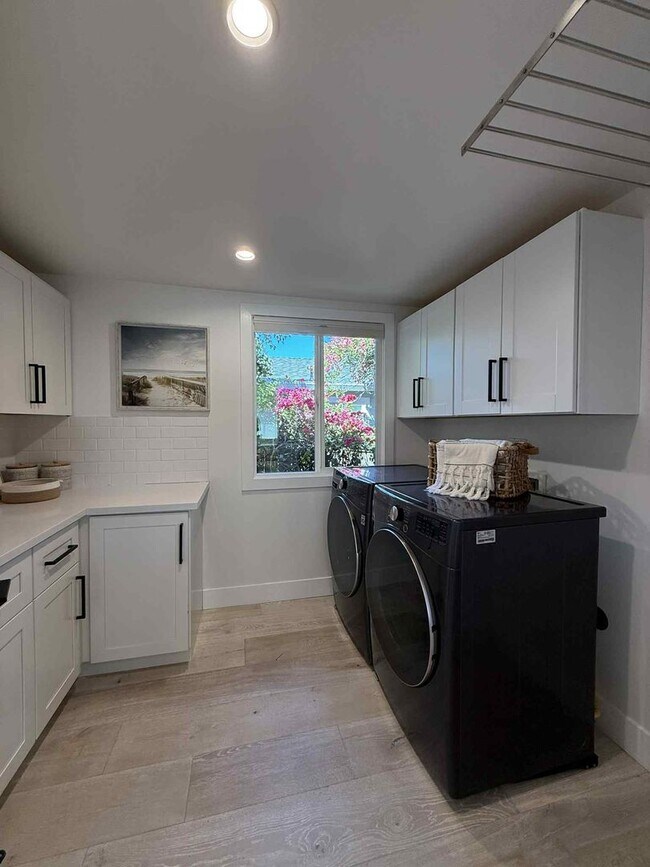 Building Photo - Modern 4-Bedroom Retreat in San Carlos – Remodeled, Spacious, Private Yard
