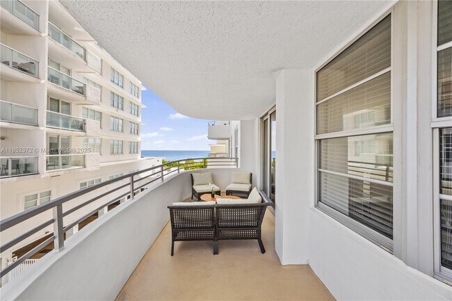 Building Photo - 5555 Collins Ave