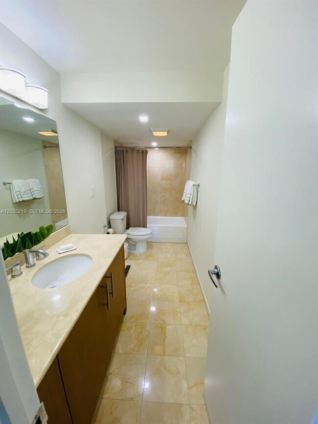 Building Photo - 10275 Collins Ave