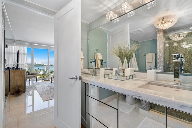 Building Photo - 10275 Collins Ave