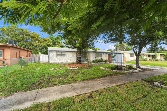 Building Photo - 4031 NW 7th Ave