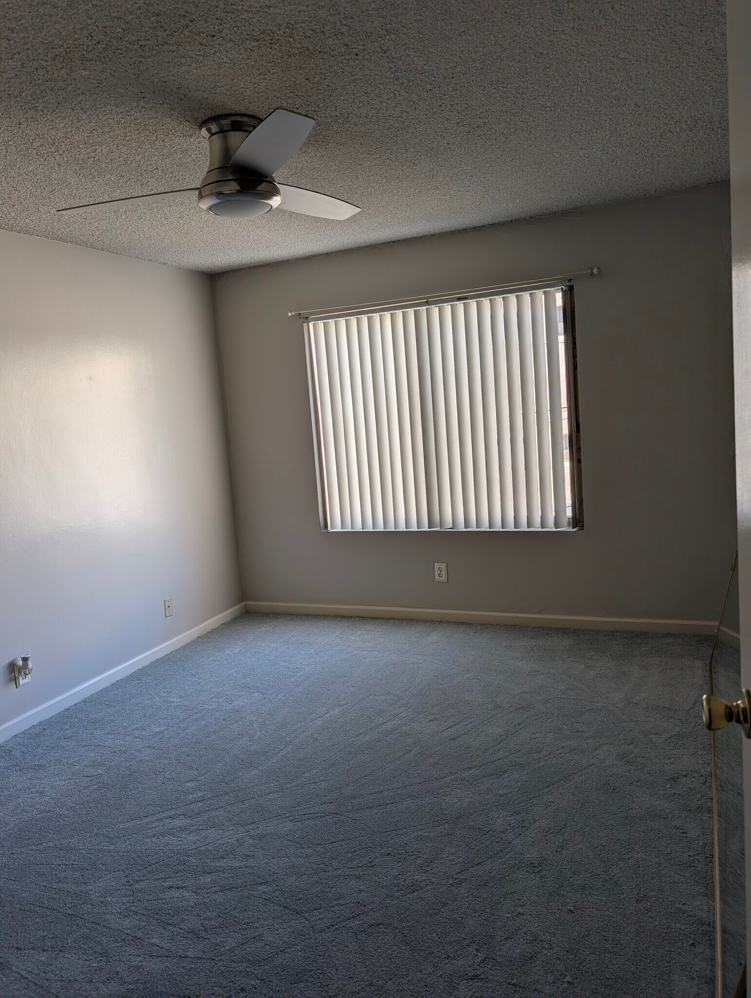 Bedroom with new carpet and fan - 215 Atlantic Ave