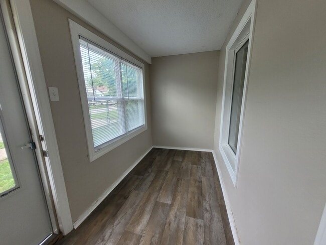 Building Photo - Two bedroom home with partially fenced yard!