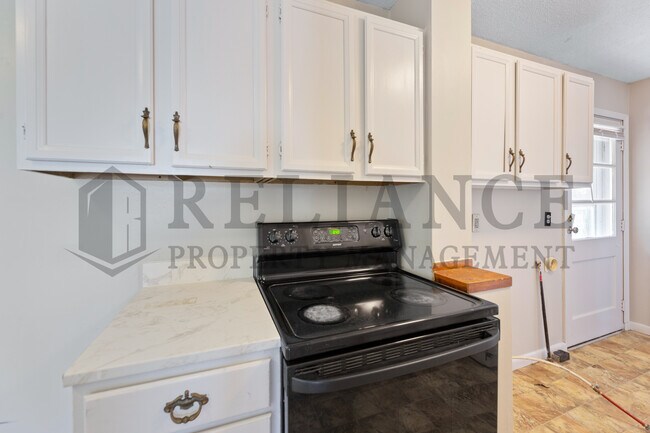 Building Photo - 7429 W Frazier Ln