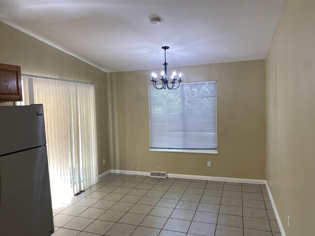 Building Photo - "Charming 3-Bed Oasis with 2 Full Baths in...