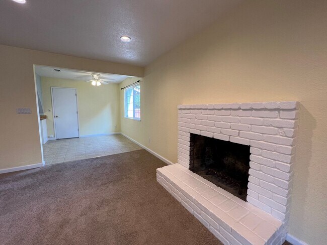Building Photo - Spacious 1,196 Square Foot  4BR Home Across from Technology High School | Large Yard & 2-Car Garage"