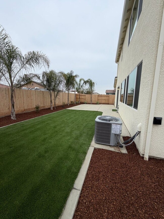 Building Photo - Spacious Brand New 4-Bedroom, 3-Bathroom Home with Solar & Low-Maintenance Yard