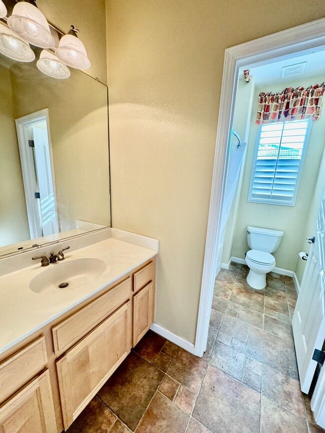 Building Photo - Located in a peaceful and well-maintained senior community, this spacious 3-bedroom, 3.5-bath Plu...