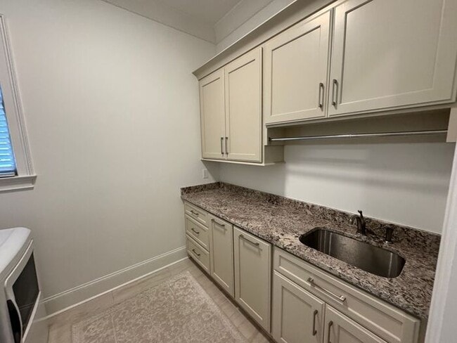 Building Photo - Rare rental opportunity in gated McMullen Cove community