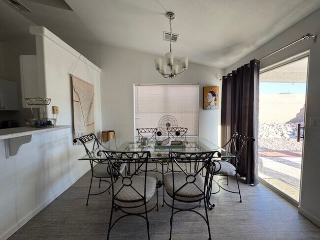 Building Photo - Pool Home with 3Bedrooms +Bonus Room Bullhead Parkway-Desert Foothills Estates- Can Be "Furnished...