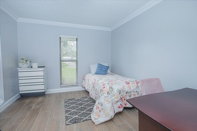 Building Photo - Beautifully Updated 3/2 Pool Home with Large Backyard in Lake Ajay (Gated Community)