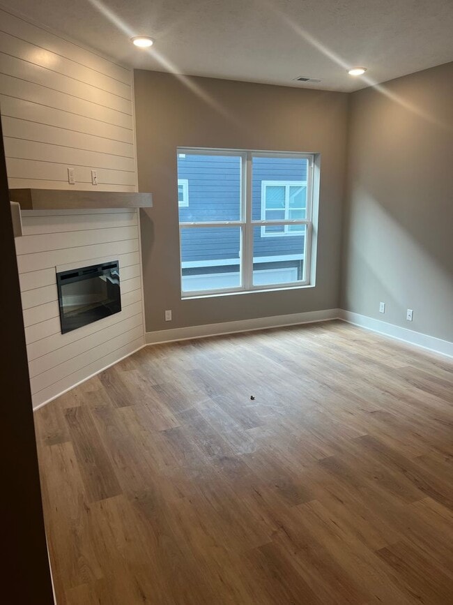 Building Photo - New Construction, 2 bed, 3 bath Row Home, with 2 car garage, fireplace, and rooftop deck!